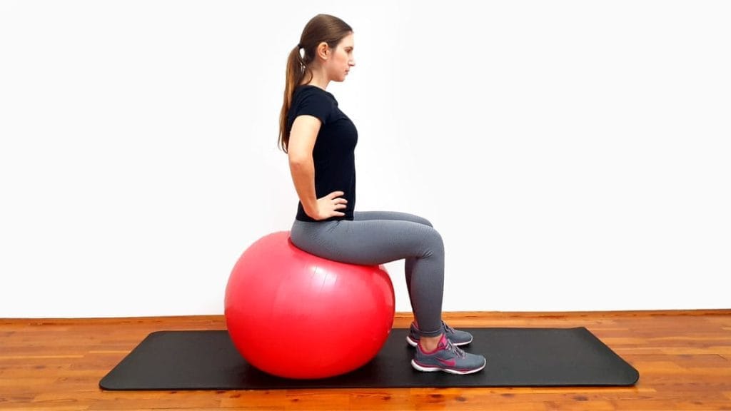 Nagib medenice na švicarski žogi korak 1